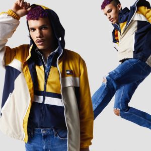 A young man wearing a casual outfit from Tommy Jeans
