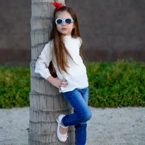 A girl wearing R&B Kids' clothing